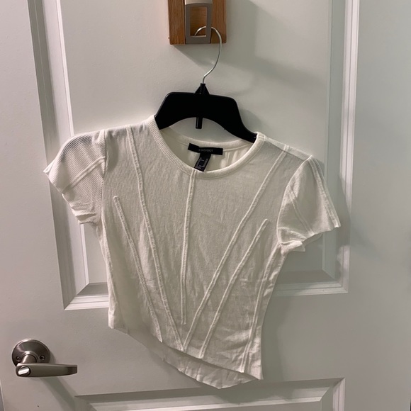 Forever 21 Tops - White asymmetrical crop top with ribbed detailing. Never worn before size XS
